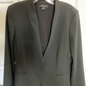 Ann Taylor Black Suit. Size 12Petite. Cutaway Blazer One button hidden closure.